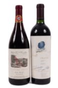 A bottle of Opus one Mondavi 1990 together with a bottle of Cigare Bolant 1995.