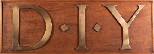 A 20th Century 'DIY' wall hanging sign.