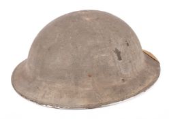 A British Mk1 steel helmet with Middlesex Regiment insignia.
