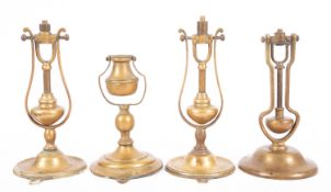 A pair of 20th Century brass gimbal wall lights.