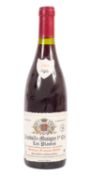A bottle of Chambolle Musigny prem. Cru Les Plantes 1997. 75cl, 13% vol.