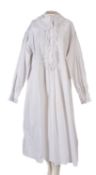 A group of four white cotton and lace Victorian style night dresses,