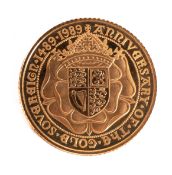 A 1989 Royal Mint proof half sovereign. Commemorating the first gold sovereign, boxed.
