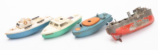 Four Sutcliffe tin plate clockwork boats.