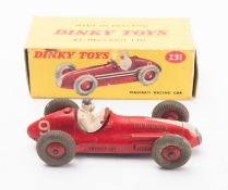 A Dinky diecast Maserati Racing car 23N. In red with white trim and in original box.