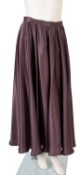 A group of three full skirts, including a 'Tom Bowker' grey satin full length skirt, size UK16,