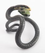 A late 19th/early 20th century cold painted figure of a snake with a frog in its mouth, unsigned 5.
