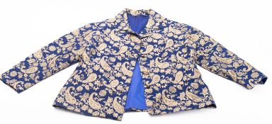 A lady's navy and gold paisley cotton suit, consisting of a matching jacket and skirt,