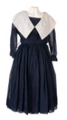 'A Rhona Roy Dress' in navy with a large white collar and full skirt, size B BS 36/34,