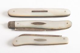 Three silver and mother of pearl handled fruit knives. Various makers and dates, largest 9cm long.