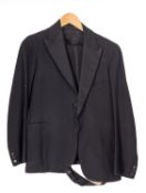 A group of four men's dinner jackets and tails,
