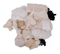 A collection of floral patterned lace, in various sizes and lengths etc.