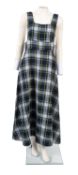 A dark green, navy blue and yellow tartan full length dress with a full skirt, size 16.