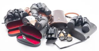 A pair of Hilkinson 8x56 field binoculars in a brown leatherette case.