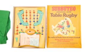 A Subbuteo table rugby game.