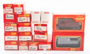 18 Tri-ang Hornby OO/HO goods wagons. Including coal wagons, sheep wagon and tanker etc, all boxed.