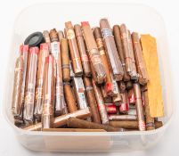 A collection of various loose cigars, including Dias De Golria short Churchill,