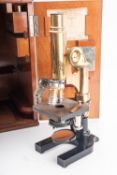An early 20th Century E Leitz, Wetzlar brass microscope.