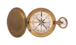 An American brass pocket compass by Waltham,