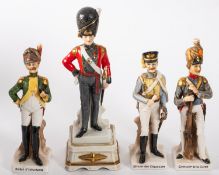 Four late 19th/early 20th Century Continental porcelain soldiers.
