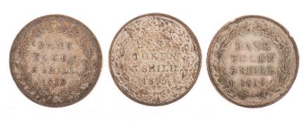 A George III 1812, 1813 and 1814 three shilling bank token.