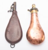 A copper powder flask, maker G and JW Hawksley. Together with a 20th Century leather shot flask.