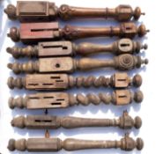 Three pairs of carved bedposts.