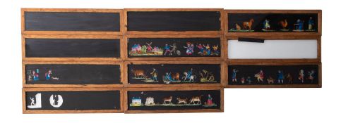 A collection of magic lantern slides telling the nursery rhyme 'This is the House that Jack Built'.