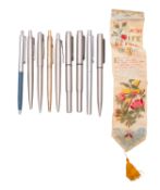 A collection of pens and propelling pencils.