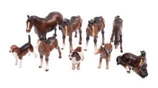 A collection of Beswick ceramic horses.