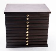 A collectors chest with ten trays of mainly 20th Century, including medallions,