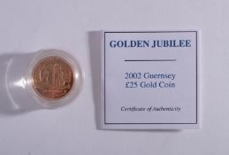 A Guernsey 2000 gold proof £25 quarter oz coin.
