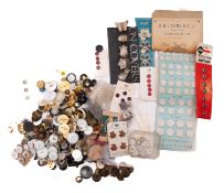 A set of white metal button covers in the form of animals.