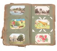 An Edwardian postcard album, including townscapes, portraits, Royal and maritime interest etc.