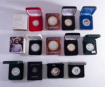 A selection of crown size silver boxed coins.