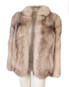 A group of three fur coats, including a full length 'M.