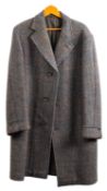 A Dunn & Co Crombie tweed herringbone overcoat, 113cm long and 56cm wide.