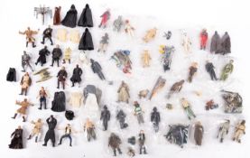 A collection of 1970s Star Wars action figures.