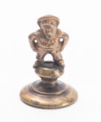 A late 19th/ early 20th century brass pipe tamper in the form of a 'Jolly Jack Tar' figure on a