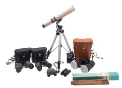 A pair of Toyoh 22x70 binoculars in a brown case.