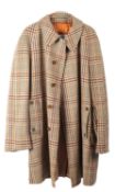 A vintage lambs wool tweed gentleman's racing coat by Aquascutum, circa 1980,