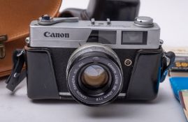 A Canon QL19 35mm SLR camera.