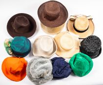 A large collection of lady's hats, including a 'Philip Somerfeild' dress hat, pill box hats,