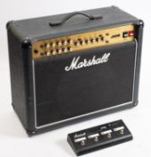 A Marshall JVM 215C amplifier. With cover, 49cm high, 60cm high, together with Marsall foot pedal.