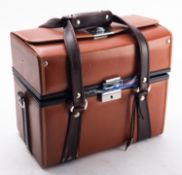 WITHDRAWN LOT A case containing a quantity of British and world coinage, half pennies and upwards,