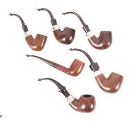 A K&P Peterson Deluxe walnut and silver mounted pipe.