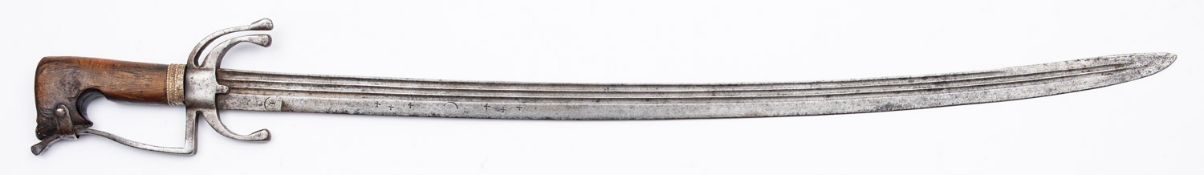 A late 19th Century North African Nimcha. Having a 77cm curved single edged steel blade,