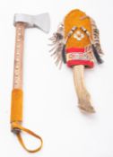 A reproduction Native American Tomohawk and antler handled Bowie knife.