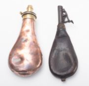 A copper powder flask by Sykes. Together with a 20th Century leather shot flask.