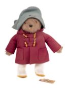 A 20th Century Paddington Bear, having celluloid eyes, a blue hat,